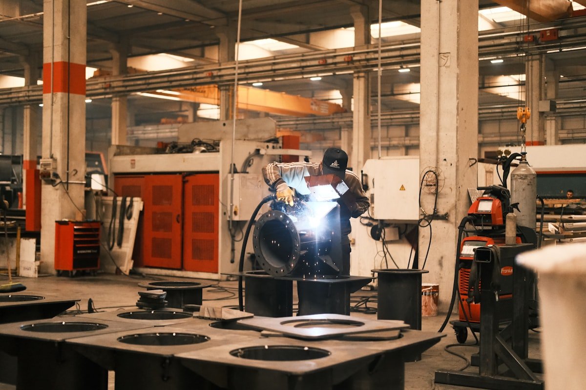 Skilled welder TIG welding a fabricated metal component